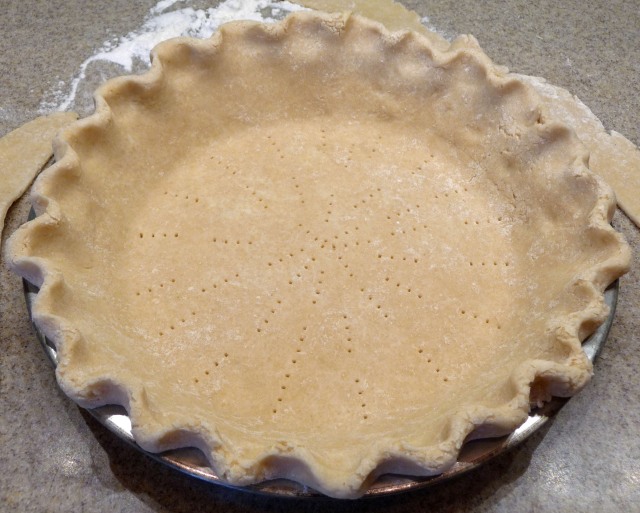 Fluted crust with holes ready to be partially prebaked (c) jfhaugen