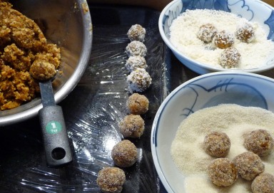 Forming sugar plums and rolling them in sugar or coconut (c) jfhaugen
